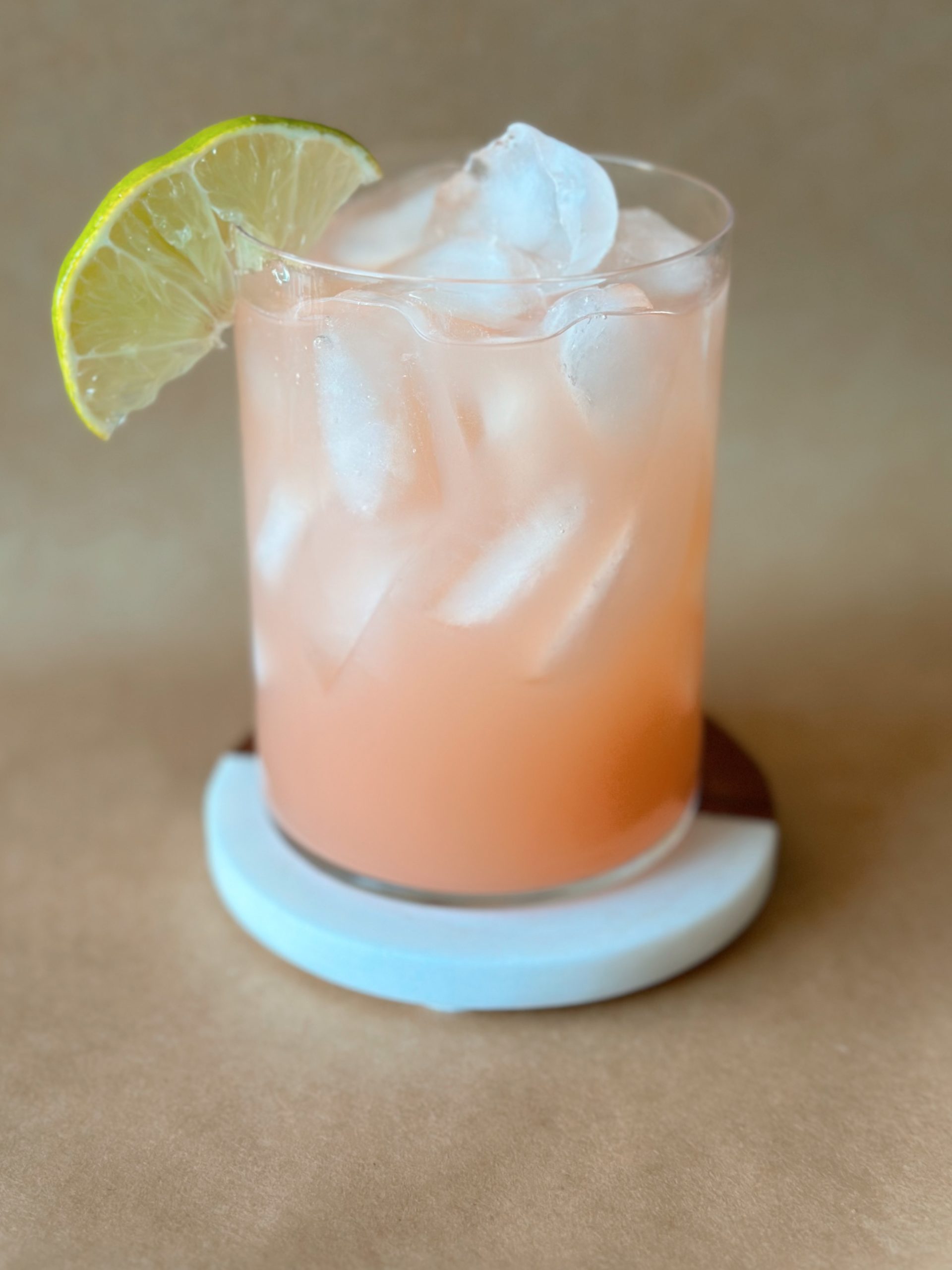 The Grand Balcony mocktail with lime wedge